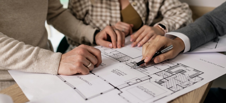 real estate agent helping clients