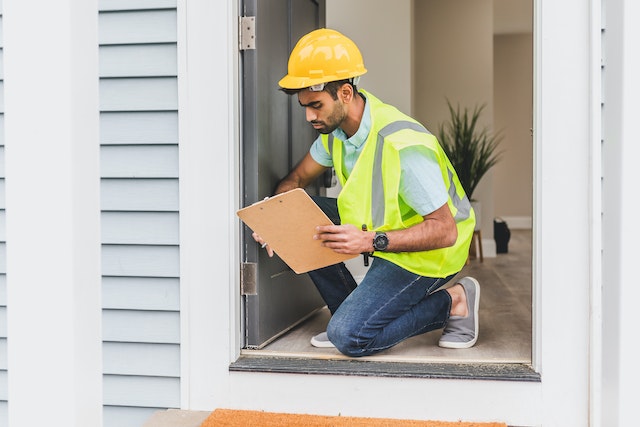 A man doing a check-up and thinking about the benefits of a home inspection